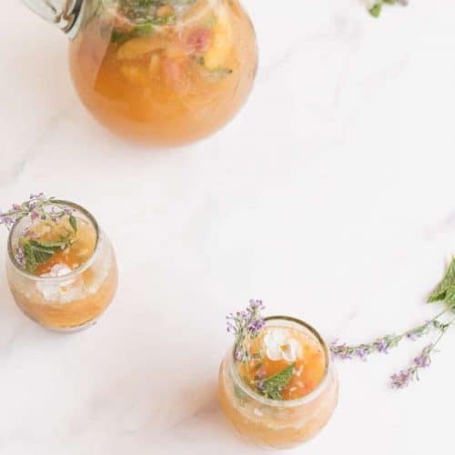 sweet peach sangria made with white wine and fresh peaches a fruity sweet refreshing cocktail